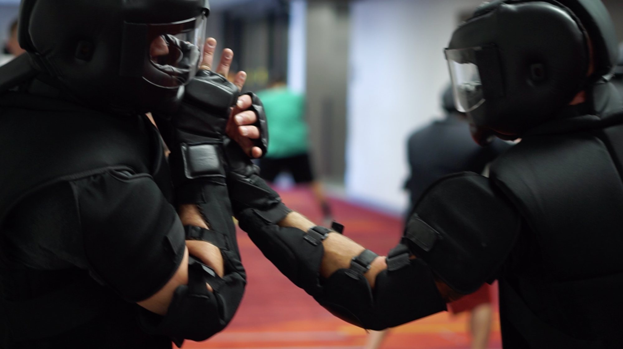 Force-on-force scenario training in High Gear® — a full-power strike landing during a live drill