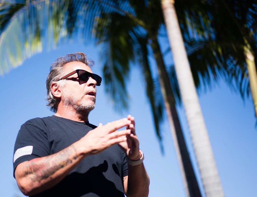 Tony Blauer coaching outdoors, mid-explanation