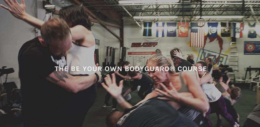 Be Your Own Bodyguard course participants drilling close-quarter defense