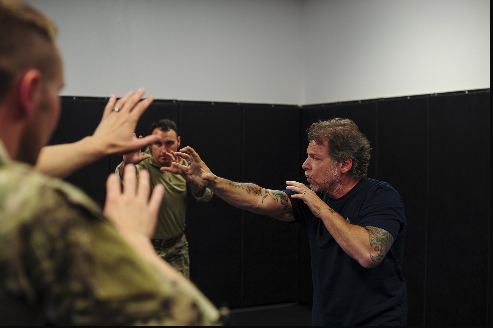 Coach Tony Blauer teaching a military training group